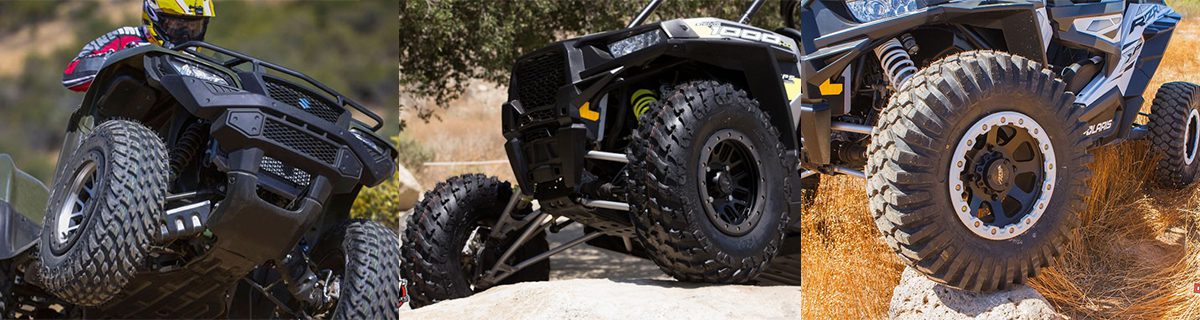 ATVs navigating rocky and rugged terrain.