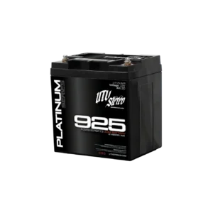 Black automotive battery on a dark background.