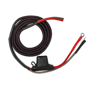 Coiled cable with connectors on black background.