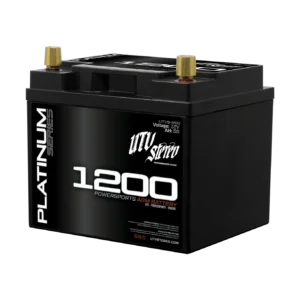 Black 1200 car battery on black background.