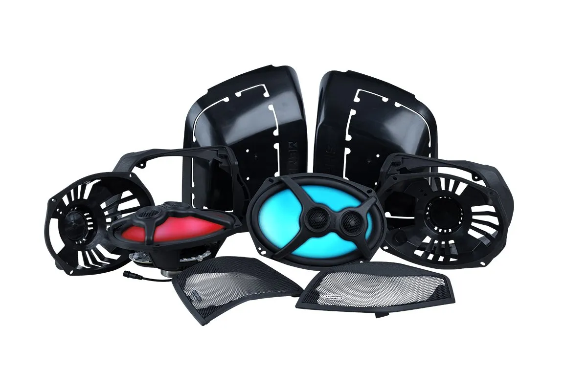 Black and colored motorcycle parts on display.