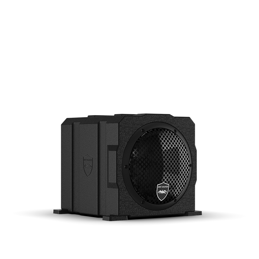 Black subwoofer speaker on black background.