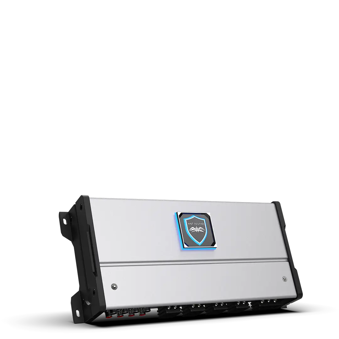 Silver car amplifier with black accents.