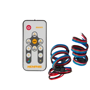 Remote control and colorful cables on black background.