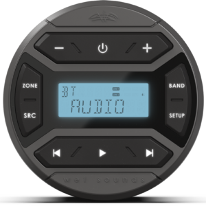 Round audio device with digital display screen.