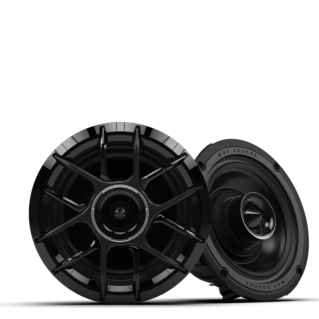 Black car speakers on a dark background.
