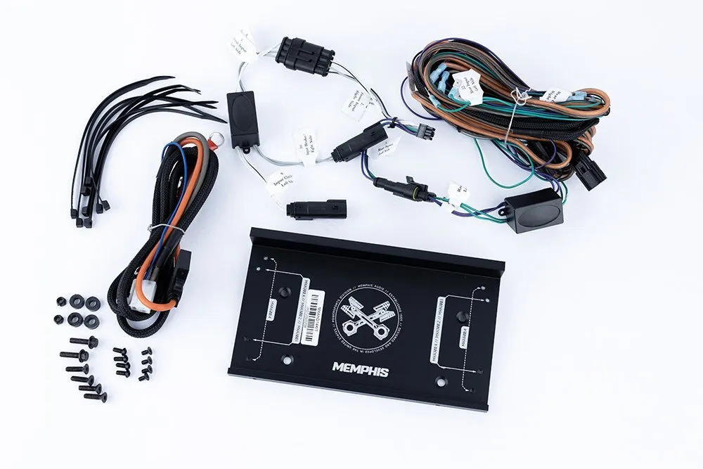 Car audio installation kit with wires.